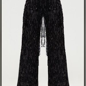 Black denim jeans, embellished tassels
